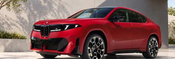 BMW's First iX4 Is an Electric Coupe SUV With Up to 603 HP 